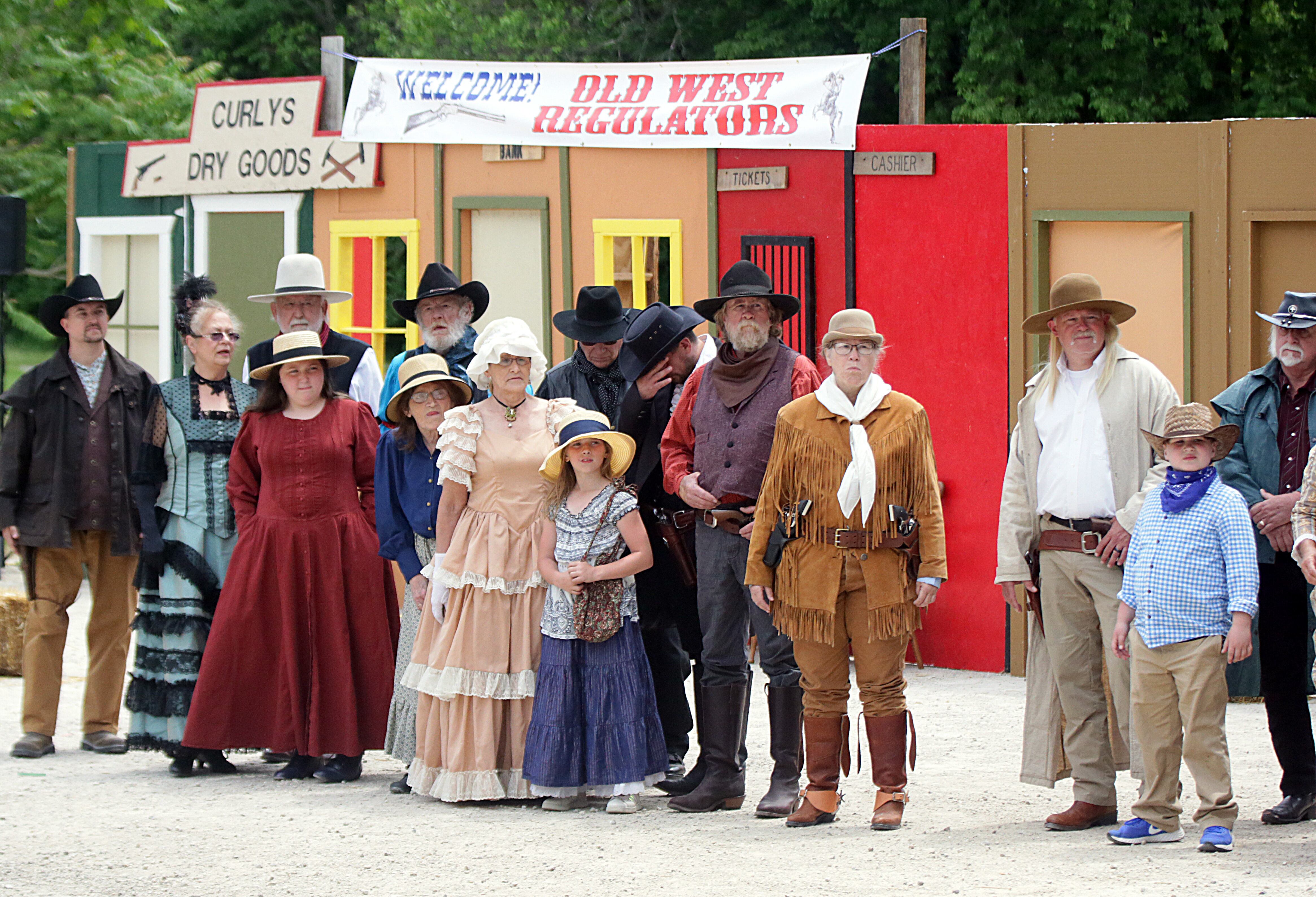 The Old West Regulators pose for a photo before acting at the Wild Bill Days event at the La Salle County Historical Society in Utica.